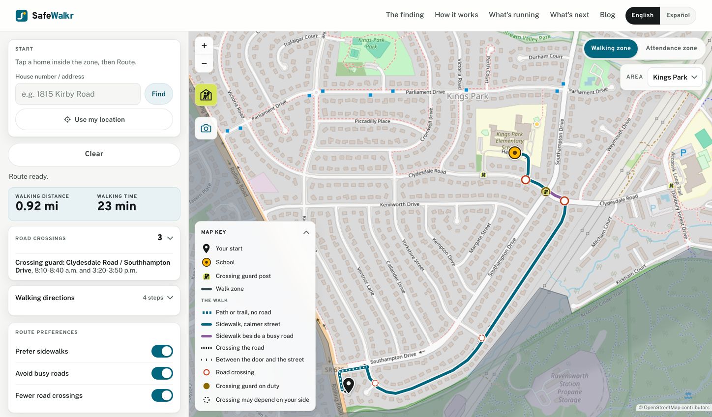 The SafeWalkr map application. A route runs from a home on Southampton Drive to Kings Park Elementary, teal along calm sidewalked streets and purple beside the busier road, with each crossing marked. The sidebar reads 0.92 miles, 23 minutes, three road crossings and the crossing guard at Clydesdale Road with duty hours, and the open map key explains every colour.